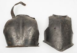 A Cromwellian-style steel breastplate and backplate: together with another breastplate and