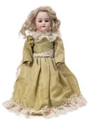 A Simon & Halbig bisque head doll:, white wig, blue glass sleeping eyes, open mouth with teeth,