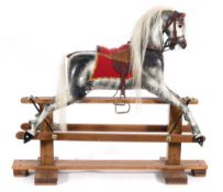 A dapple grey Rocky II rocking horse: with flared nostrils, open mouth, horse hair mane and tail,