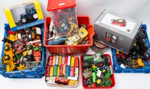 A collection of various diecast farm vehicles and others:,