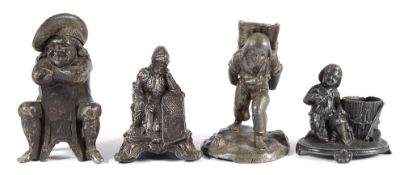A group of eight 19th century and later pewter vesta holders:, including a knight in armour,