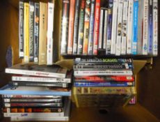 A collection of assorted DVD's: relating to pop groups, films and jazz.