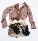 An Edwardian white silk and brown lace bodice with anthemion beadwork panel to chest:,