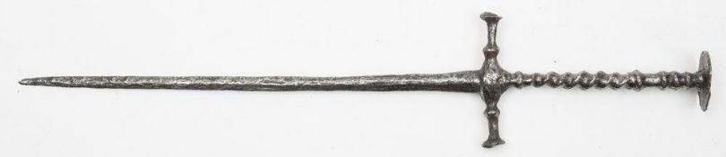 A 17th century steel stiletto dagger in excavated condition:,