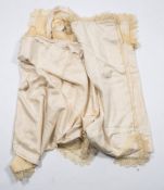 Two late Victorian lace edged cream silk capes:,