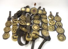 A group of seven Victorian martingales and heavy horse tack:,