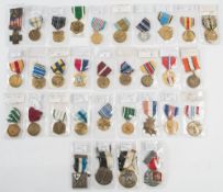 A collection of American military and national service medals:, including Coastguard,