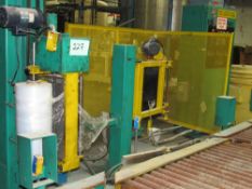 Signoid Automatic Stretch Wrapper with 12 ft indfeed and 12 ft outfeed roller conveyor. Currently