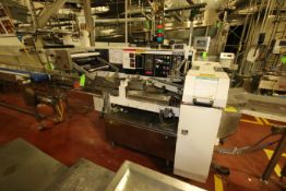 FMC Flo Wrapper, Model SERVO FLO, S/N 4309-0550 with Allen Bradley 5/20 PLC Controls (Rigging