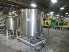 Stainless steel 400 gallon tank, cone bottom, three zone jackets, on casters.