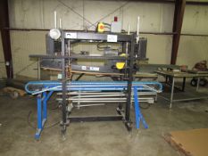 Motorized Conveyor on bottom and Packaging Automation Conveyor on top, 230 Volt. Was used to press