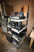 Lot of Assorted Electronics on (3) Shelving Units, Includes Dell Monitors, Speakers, Modums, Receipt