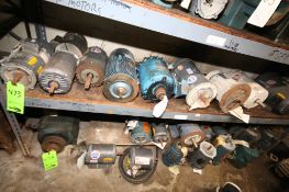Lot of Assorted Used Electric Motors on Floor and First Shelf: Fractional to 5HP Approx. 27 Pieces