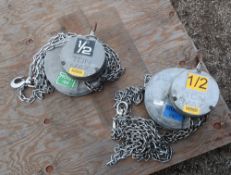 Lot of (2) 1/2 ton manual chain hoists.