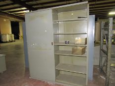 One lage metal cabinet with sliding doors -- Removal and loading free. Optional prep for shipping $
