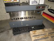 Terg-Otomerer Six Chamber Soap tester with temperature and speed controllers. Removal and loading