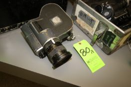 Canon Scoopic 16 Camera 16mm film camera - employs an EE mechanism with zoom and macro lens, film