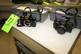 Minolta 35mm Camera - Compatible with all Minolta MD Rokkor Lenses, electronic shutter, Batteries