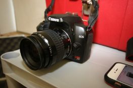 Canon Rebel XS Camera - 10.1 MP APS-C size CMOS sensor and DIGIC III image processor, 2.5-inch