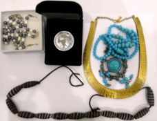 Large quantity of costume jewellery including bead necklaces, rings, etc.