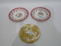 Pair of 19th century porcelain plates, pink bordered, painted floral swags to centre and border, 25.