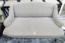 Two-seater sofa on turned supports