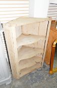 19th century stripped oak corner cupboard with four open-shaped shelves and reeded canted corners