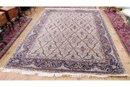 Indo-Persian ivory and blue carpet,