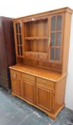Modern cherrywood kitchen dresser, the upper section with open shelves,