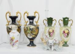 Pair of Edwardian pottery vases with green ground, baluster-shaped with scroll gilt handles,