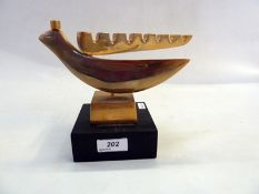 Gilt brass limited edition Menorah with dove of peace, by Casson 18/190, on plinth base,