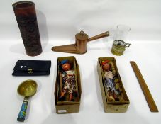 Hurricane lamp held within a brass carrier, carved wooden vase, copper foot warmer,