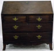 Georgian mahogany gentleman's bureau, the fall front enclosing central cupboard,