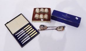 Set of six Oriental white metal dragon pattern napkin rings, plated servers,