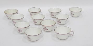 Quantity of monogrammed china to include a set of 11 fine porcelain teacups,