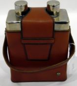 Pair of chrome and glass flasks within a leather carry case/travelling case