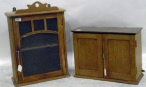 Old pine wall cupboard with glazed door enclosing shelf,