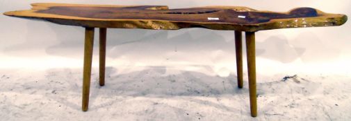 Modern naturalistic coffee table on turned tapering legs,