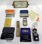 Mother-of-pearl and painted silk fan, handpainted with floral sprays, boxed (damaged),