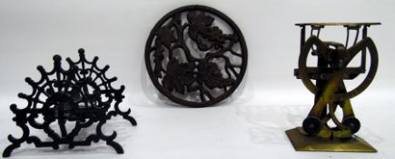 Pair of brass balance letter scales, a folding pierced iron pen rack and an iron trivet,