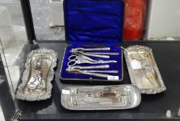 Victorian silver plated nutcracker and grape scissors set engraved with scrolling foliage,