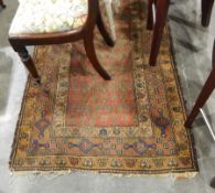 Eastern wool runner with stylised flowerhead trelliswork to the madder field, multiple borders,