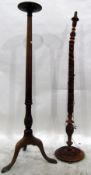 Two foliate carved standard lamp pedestals,