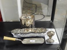 Plated on copper tea caddy, oval and serpentine sided, cream-handled and silver plated crumb scoop,