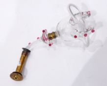 Victorian cranberry, clear glass and brass light sconce, the clear cup with rope border,