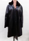 Brown leather coat labelled Reward of London, size 10, detachable beaver collar, brass buttons,