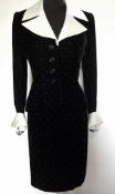 Oscar de la Renta black velvet skirt suit with white spot detail, deep satin collar,