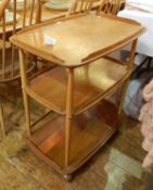 Ercol three-tier trolley on castors,