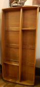 Ercol light elm two-shelf wall rack with label to reverse,