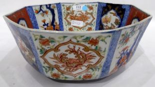 Japanese octagonal bowl, sides decorated decorated in the Imari palette with flowers, bats etc,